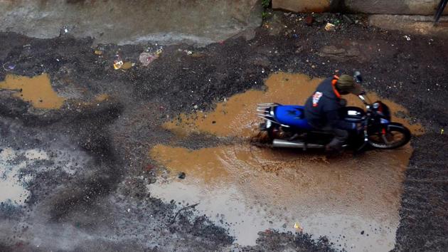 The recent rain and waterlogging has left several parts of the road in bad shape at Ambegaon Pathar in Pune, India. (Rahul Raut / ht photo) The recent rain and waterlogging has left several parts of the road in bad shape at Ambegaon Pathar in Pune, India. (Rahul Raut / ht photo)