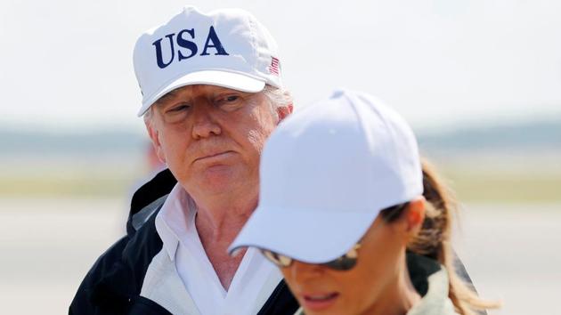 US President Donald Trump arrives with first lady Melania Trump to receive a briefing on Hurricane Irma relief efforts and tour storm damage in Fort Myers on September 14.(Reuters Photo) US President Donald Trump arrives with first lady Melania Trump to receive a briefing on Hurricane Irma relief efforts and tour storm damage in Fort Myers on September 14.(Reuters Photo)