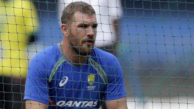 Australian cricket player Aaron Finch rests during a practice session in Indore, India, Saturday, Sept. 23, 2017.(AP)