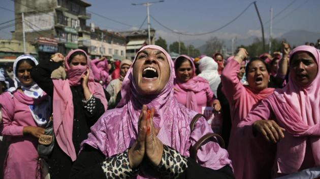 Kashmiri Anganwadi workers, government sponsored child and mother care workers, shout slogans against the government during a protest in Srinagar. (Mukhtar Khan / AP) Kashmiri Anganwadi workers, government sponsored child and mother care workers, shout slogans against the government during a protest in Srinagar. (Mukhtar Khan / AP)