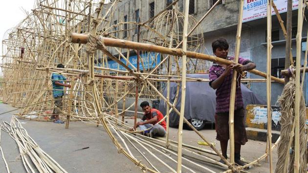 Indian craftsmen make effigies of the Hindu demon-king 'Ravana' at a workshop ahead of the Hindu festival of 'Dussehra', in Amritsar . Held at the end of the Navratri (nine nights) Festival, Dussehra symbolises the victory of good over evil in Hindu mythology. On the night of Dussehra, firecrackers and stuffed effigies of Ravana are set alight in open grounds across the country. (NARINDER NANU / AFP) Indian craftsmen make effigies of the Hindu demon-king 'Ravana' at a workshop ahead of the Hindu festival of 'Dussehra', in Amritsar . Held at the end of the Navratri (nine nights) Festival, Dussehra symbolises the victory of good over evil in Hindu mythology. On the night of Dussehra, firecrackers and stuffed effigies of Ravana are set alight in open grounds across the country. (NARINDER NANU / AFP)