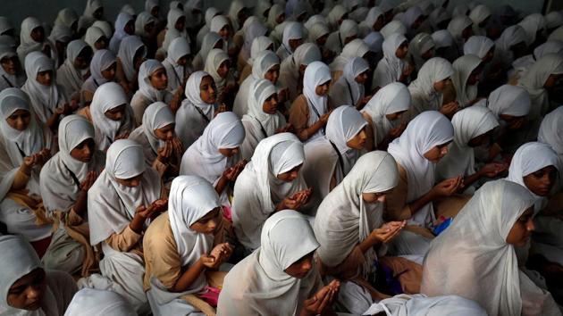 Students offer prayers during a ceremony to mark International Peace Day in Ahmedabad, India. (Amit Dave / REUTERS) Students offer prayers during a ceremony to mark International Peace Day in Ahmedabad, India. (Amit Dave / REUTERS)