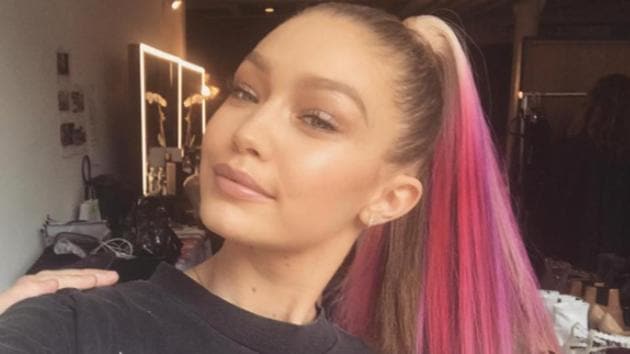 Gigi Hadid’s ponytail features bright pink, punk-like streaks. (Courtesy: Gigi Hadid/Instagram) Gigi Hadid’s ponytail features bright pink, punk-like streaks. (Courtesy: Gigi Hadid/Instagram)