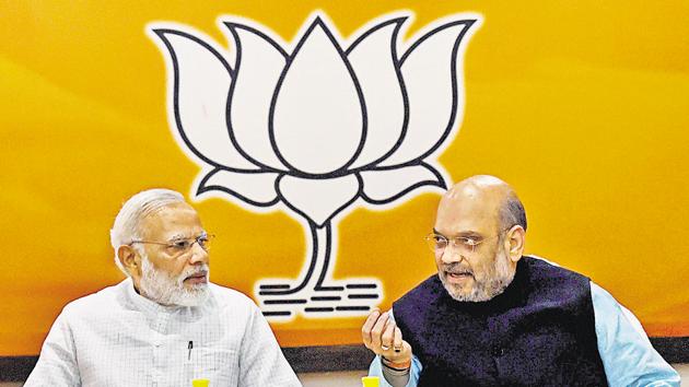 Prime Minister Narendra Modi and BJP president Amit Shah at a party's parliamentary board meeting in New Delhi.(PTI File Photo)