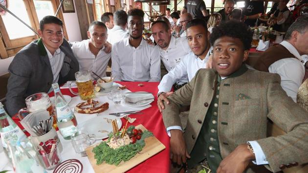 Bayern Munich's players pose during the traditional visit of FC Bayern Munich to the Oktoberfest beer festival in Munich, Germany. (AFP) Bayern Munich's players pose during the traditional visit of FC Bayern Munich to the Oktoberfest beer festival in Munich, Germany. (AFP)