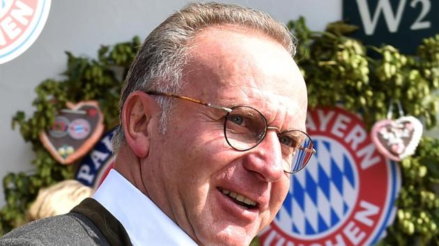 Karl-Heinz Rummenigge, CEO of German first division Bundesliga football club FC Bayern Munich, holds a beer mug as he poses during the traditional visit of members of German first division Bundesliga football club Bayern Munich at the Oktoberfest beer festival in Munich, Germany. (AFP) Karl-Heinz Rummenigge, CEO of German first division Bundesliga football club FC Bayern Munich, holds a beer mug as he poses during the traditional visit of members of German first division Bundesliga football club Bayern Munich at the Oktoberfest beer festival in Munich, Germany. (AFP)