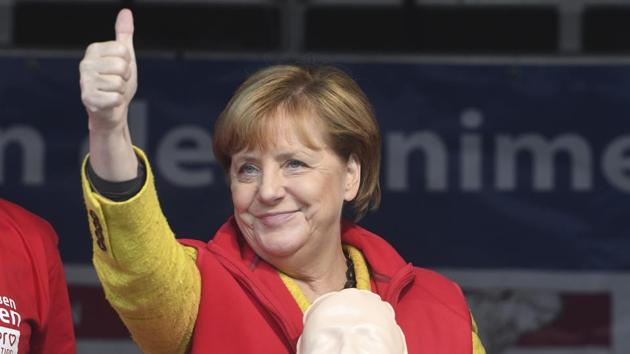 German chancellor Angela Merkel stands on stage in Greifswald, Germany, Saturday, Sept. 23, 2017. (AP) German chancellor Angela Merkel stands on stage in Greifswald, Germany, Saturday, Sept. 23, 2017. (AP)