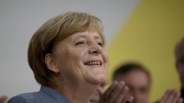 German Chancellor Angela Merkel arrives for a statement on the parliament election at the headquarters of the Christian Democratic Union CDU in Berlin, Germany. (AP Photo) German Chancellor Angela Merkel arrives for a statement on the parliament election at the headquarters of the Christian Democratic Union CDU in Berlin, Germany. (AP Photo)