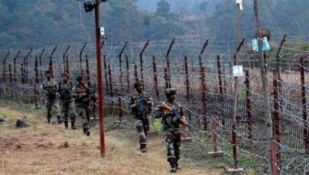 Indian soldiers stand guard near the Line of Control. (PTI File Photo) Indian soldiers stand guard near the Line of Control. (PTI File Photo)