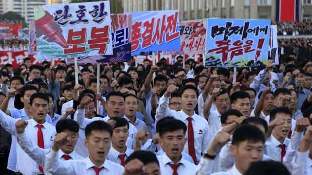 Hundreds of thousands of North Koreans gathered at Kim Il Sung Square to attend a mass rally against America on Saturday September 23 in Pyongyang, a day after the country's leader issued a rare statement attacking Donald Trump.(AP Photo)