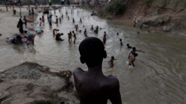 Rohingya refugees swim in a river running through a camp in Cox's Bazar, Bangladesh. (Cathal McNaughton / REUTERS) Rohingya refugees swim in a river running through a camp in Cox's Bazar, Bangladesh. (Cathal McNaughton / REUTERS)