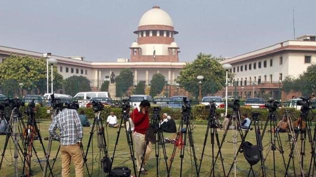 Tripods of television crew in front of the Supreme Court building in New Delhi. (File) Tripods of television crew in front of the Supreme Court building in New Delhi. (File)