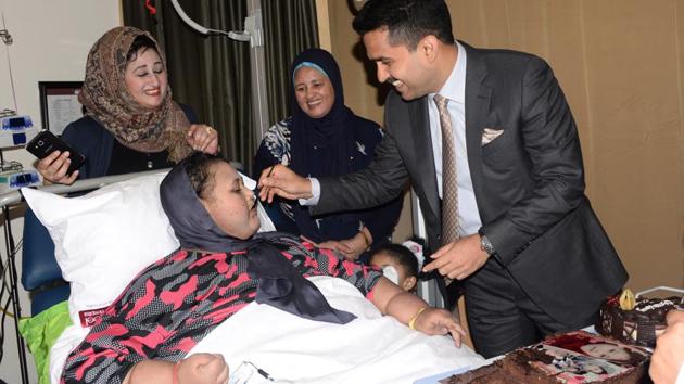 Eman Ahmed, 37, with Dr Shamsheer Vayalil during her birthday celebrations at Burjeel Hospital in Abu Dhabi.(HT Photo)