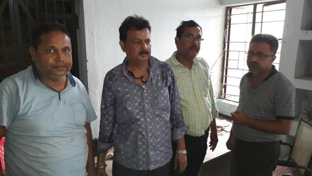 The persons who were arrested with liquor bottles in Purnia district of Bihar.(HT photo)