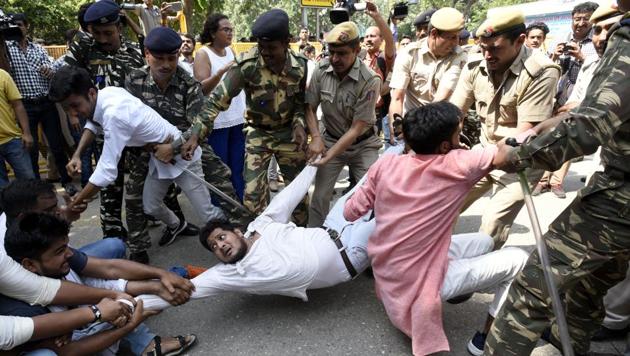 Akhil Bharatiya Vidyarthi Parishad (ABVP) activists protest in New Delhi on Monday, September 25, against the lathi-charge at BHU. (Sonu Mehta/HT PHOTO) Akhil Bharatiya Vidyarthi Parishad (ABVP) activists protest in New Delhi on Monday, September 25, against the lathi-charge at BHU. (Sonu Mehta/HT PHOTO)