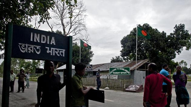 People at the Burimari land border crossing in Lalmonirhat District, Bangladesh. Currently, exports from Northeast India to Bangladesh include resource-based products such as coal, limestone, boulders, and agricultural products.(Getty Images)