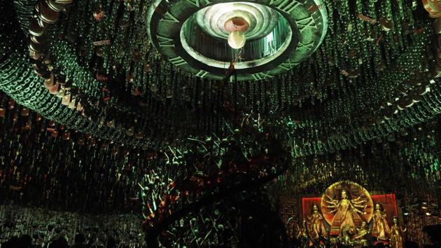 Suspended from the ceiling of the pandal are sets of keys and locks as interpreted by the Barisha Club Durga Puja Pandal in Behala. (Samir Jana / HT Photo) 