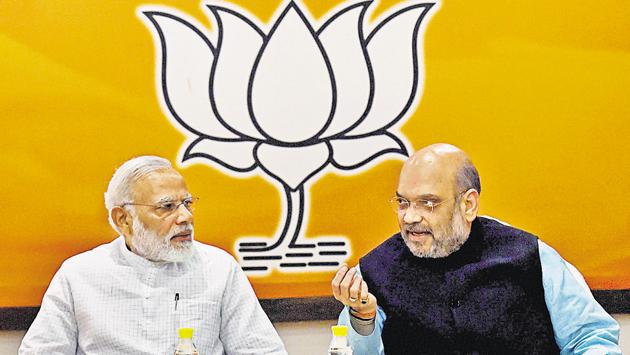Prime Minister Narendra Modi and BJP national president Amit Shah at the party’s parliamentary board meeting, in New Delhi, in June. The BJP brass is also expected to read out among the party’s many achievements the flushing out of terrorists in Kashmir and the diplomatic feats of standing up to China’s bullying tactics.(PTI File Photo)