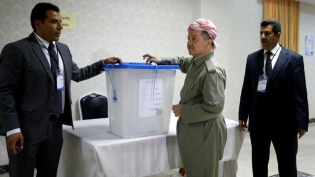 Iraqi Kurdish President Masoud Barzani (C) casts his vote during the referendum in Erbil. The non-binding vote on the Kurds’ dream of independence, initiated by veteran leader Barzani, angered not only the federal government but also Turkey and Iran, concerned it could stoke separatist aspirations among their own Kurdish minorities. The US and other Western nations have also raised concerns, saying the vote could hamper the fight against ISIS in which cooperation between Baghdad and the Kurds has been key. (Azad Lashkari / REUTERS) Iraqi Kurdish President Masoud Barzani (C) casts his vote during the referendum in Erbil. The non-binding vote on the Kurds’ dream of independence, initiated by veteran leader Barzani, angered not only the federal government but also Turkey and Iran, concerned it could stoke separatist aspirations among their own Kurdish minorities. The US and other Western nations have also raised concerns, saying the vote could hamper the fight against ISIS in which cooperation between Baghdad and the Kurds has been key. (Azad Lashkari / REUTERS)