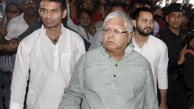 RJD chief Lalu Prasad with his son and leader of opposition Tejashwi Yadav heading to Bhagalpur, in Patna on Saturday. (PTI Photo) RJD chief Lalu Prasad with his son and leader of opposition Tejashwi Yadav heading to Bhagalpur, in Patna on Saturday. (PTI Photo)