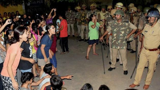BHU students and police in a standoff in Varanasi late on Saturday night. (PTI Photo) BHU students and police in a standoff in Varanasi late on Saturday night. (PTI Photo)