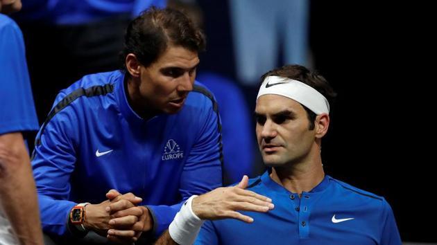 Roger Federer and Rafael Nadal of team Europe react during the match. (REUTERS) Roger Federer and Rafael Nadal of team Europe react during the match. (REUTERS)