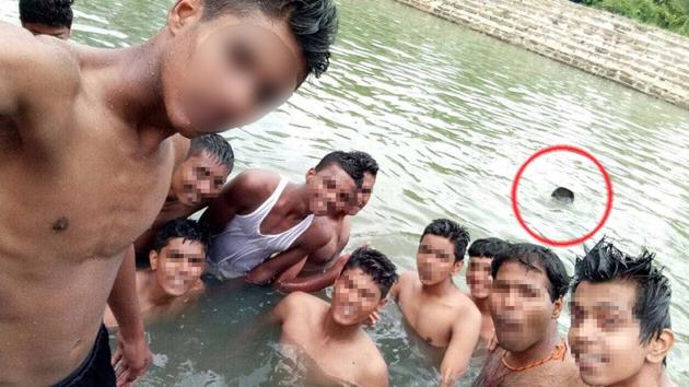 The NCC cadets taking a selfie at a temple tank. The Class 12 student can be seen drowning. (Special arrangement) The NCC cadets taking a selfie at a temple tank. The Class 12 student can be seen drowning. (Special arrangement)