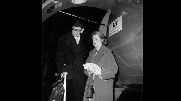 T. S. Eliot with his second wife Valerie (1926 - 2012), returning from their French honeymoon on the BEA (British European Airways) Airspeed AS 57 Ambassador, ‘Sir Walter Raleigh,’ February 01, 1957. (Ronald Dumont / Express / Hulton Archive / Getty Images) T. S. Eliot with his second wife Valerie (1926 - 2012), returning from their French honeymoon on the BEA (British European Airways) Airspeed AS 57 Ambassador, ‘Sir Walter Raleigh,’ February 01, 1957. (Ronald Dumont / Express / Hulton Archive / Getty Images)
