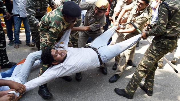 The BHU campus unrest has triggered a blame game among political parties as Congress vice president Rahul Gandhi and Samajwadi Party chief Akhilesh Yadav hit out at the BJP-led government of Yogi Adityanath. Police detained ABVP members who were protesting outside HRD Ministry in New Delhi. (PTI) The BHU campus unrest has triggered a blame game among political parties as Congress vice president Rahul Gandhi and Samajwadi Party chief Akhilesh Yadav hit out at the BJP-led government of Yogi Adityanath. Police detained ABVP members who were protesting outside HRD Ministry in New Delhi. (PTI)