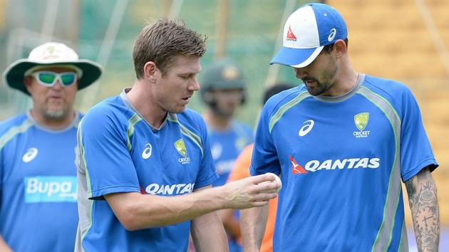 James Faulkner and Kane Richardson (R) talk during a practice session ahead of the fourth ODI at the M. Chinnaswamy Stadium in Bangalore. (AFP) James Faulkner and Kane Richardson (R) talk during a practice session ahead of the fourth ODI at the M. Chinnaswamy Stadium in Bangalore. (AFP)