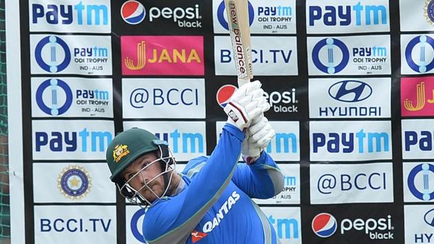 Aaron Finch bats during a practice session ahead of the fourth ODI at the M. Chinnaswamy Stadium in Bangalore. (AFP) Aaron Finch bats during a practice session ahead of the fourth ODI at the M. Chinnaswamy Stadium in Bangalore. (AFP)