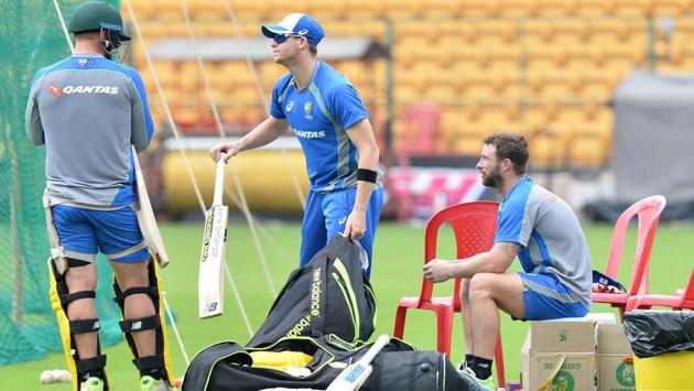 Steven Smith (C) prepares to bat as teammate Matthew Wade (R) looks on during a practice session ahead of the fourth ODI at the M. Chinnaswamy Stadium in Bangalore. (AFP) Steven Smith (C) prepares to bat as teammate Matthew Wade (R) looks on during a practice session ahead of the fourth ODI at the M. Chinnaswamy Stadium in Bangalore. (AFP)