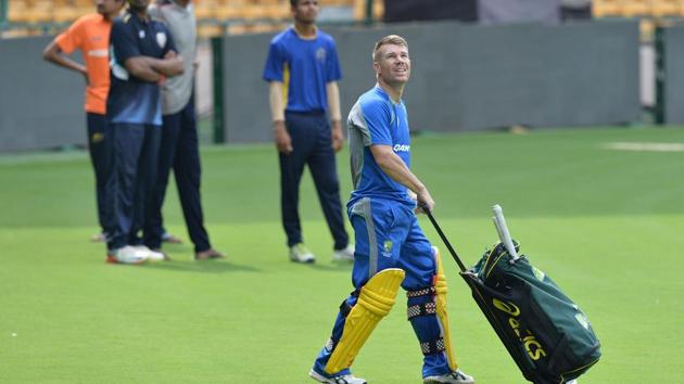 David Warner arrives for a practice session ahead of the fourth ODI of the ongoing India-Australia cricket series at the M. Chinnaswamy Stadium in Bangalore. (AFP) David Warner arrives for a practice session ahead of the fourth ODI of the ongoing India-Australia cricket series at the M. Chinnaswamy Stadium in Bangalore. (AFP)