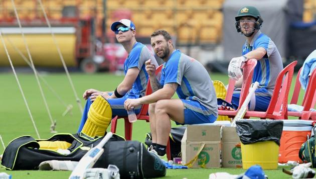 Australian cricket team captain Steven Smith (L) and teammates Matthew Wade (C) and Travis Head look on during a practice session ahead of the fourth One Day International (ODI) match of the ongoing India-Australia cricket series at the M. Chinnaswamy Stadium in Bangalore on September 26, 2017. (AFP) Australian cricket team captain Steven Smith (L) and teammates Matthew Wade (C) and Travis Head look on during a practice session ahead of the fourth One Day International (ODI) match of the ongoing India-Australia cricket series at the M. Chinnaswamy Stadium in Bangalore on September 26, 2017. (AFP)