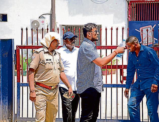 Former Noida chief engineer Yadav Singh (in blue cap), during a hearing at the court in Ghaziabad. (Sakib Ali/HT Photo) Former Noida chief engineer Yadav Singh (in blue cap), during a hearing at the court in Ghaziabad. (Sakib Ali/HT Photo)