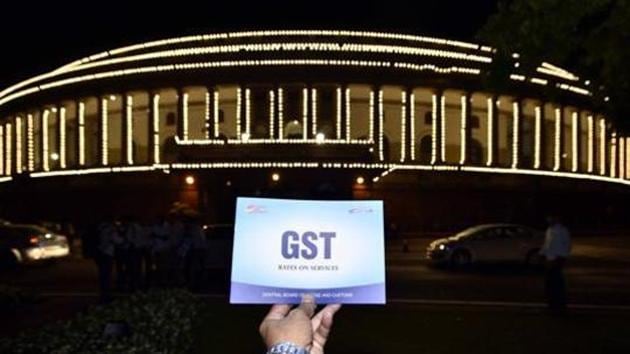 The Parliament building is lit up for a special session for the GST launch, in New Delhi on June 30, 2017.(Arun Sharma/HT File Photo)