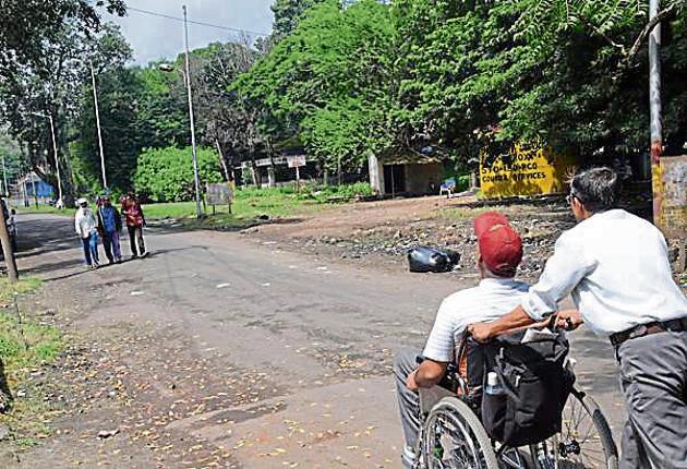 The spot where a black garbage bag lies at the corner of Aundh-Khadki road and Park road was once a stinking pit.(HT FILE PHOTO)