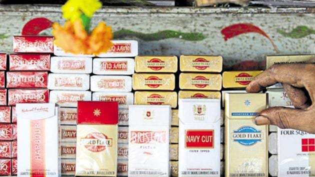 Cigarette packets are displayed at a shop in Mumbai.(AP File Photo)