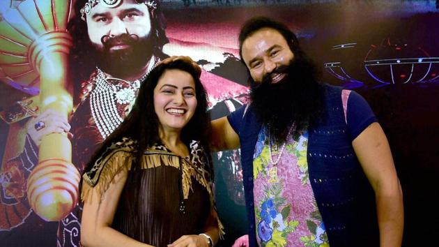 Honeypreet Insan seen with Gurmeet Ram Rahim Singh at the promotion of the film MSG - The Warrior Lion Heart. (PTI) Honeypreet Insan seen with Gurmeet Ram Rahim Singh at the promotion of the film MSG - The Warrior Lion Heart. (PTI)