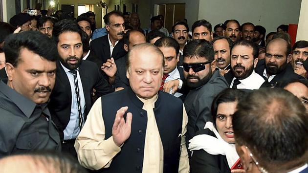In this photo released by the PML-N party, deposed premier Nawaz Sharif arrives at an anti-corruption court in Islamabad on September 26, 2017. Sharif made his first appearance in the court to face corruption charges. He was disqualified by the Supreme Court on July 28 following a probe that concluded he had concealed financial assets.(AP)