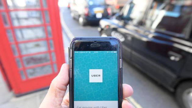 A person uses the Uber app on a mobile phone in London. Uber will stop operating in the Canadian province of Quebec.(REUTERS / Representational Photo) A person uses the Uber app on a mobile phone in London. Uber will stop operating in the Canadian province of Quebec.(REUTERS / Representational Photo)