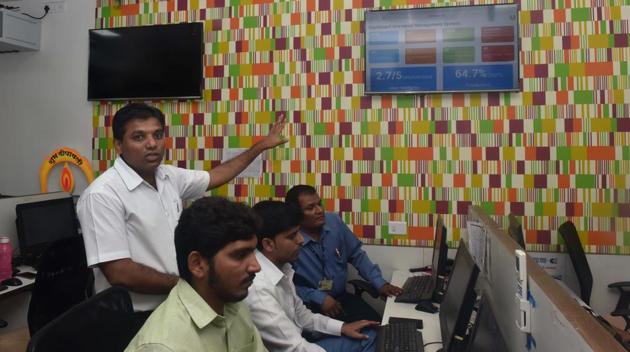 Rahul Jagtap, IT head PMC Care with his team in Pune on Monday, September 25.(Pratham Gokhale/HT PHOTO)