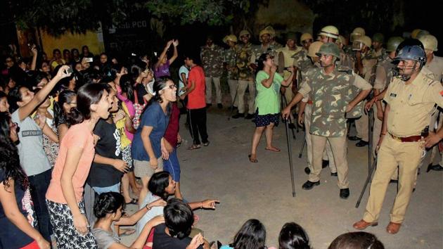 Students and police in a standoff in Varanasi late Saturday night. BHU students said that they undertook the protest near the university’s main gate against rising incidents of eve-teasing on the campus. A female student of the Arts Faculty was allegedly harassed by three motorcycle-borne men inside the campus while returning to her hostel, triggering the protest. (PTI) Students and police in a standoff in Varanasi late Saturday night. BHU students said that they undertook the protest near the university’s main gate against rising incidents of eve-teasing on the campus. A female student of the Arts Faculty was allegedly harassed by three motorcycle-borne men inside the campus while returning to her hostel, triggering the protest. (PTI)