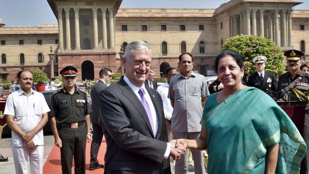 Defence minister Nirmala Sitharaman shakes hands with US Defense Secretary James Mattis at South Block, in New Delhi, on Tuesday.(Ajay Aggarwal/HT Photo)