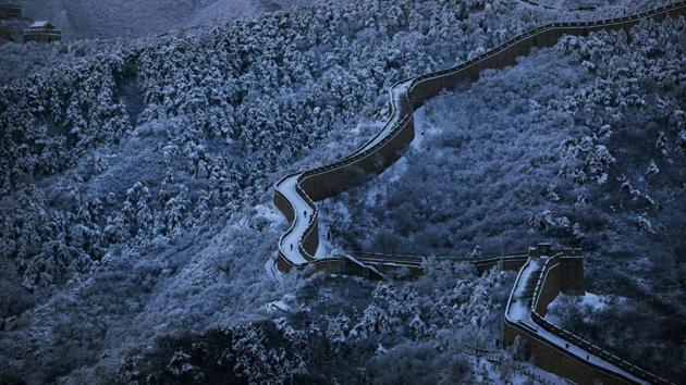 The Great Wall of China, also one of the Seven Wonders of the World, is even more stunning when covered in snow. (Kevin Frayer / Getty Images) The Great Wall of China, also one of the Seven Wonders of the World, is even more stunning when covered in snow. (Kevin Frayer / Getty Images)