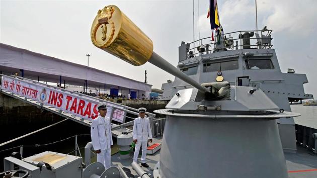 Navy soldiers during the commissioning of INS Tarasa, Water Jet Fast Attack Crafts (WJFAC) in Mumbai on Tuesday. INS Tarasa is 50 metres long, powered by three waterjets which give it speed of over 35 knots (65 kmph), and is armed with a 30mm main gun and several light, medium and heavy machine guns. It is commandeered by Lt Commander Praveen Kumar. (Shashank Parade / PTI)