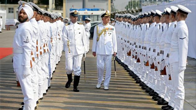 Flag Officer Commanding-in-Chief, Western Naval Command, Vice Admiral Girish Luthra inspects a guard of honour during the commissioning of INS Tarasa. It is the fourth and last of the Water Jet FACs built by Garden Reach Shipbuilders & Engineers, Kolkata. (Shashank Parade / PTI)