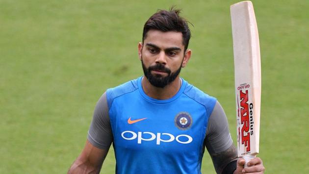 Virat Kohli returns after a net practice session ahead of the fourth ODI at the M. Chinnaswamy Stadium in Bangalore.  (AFP) 