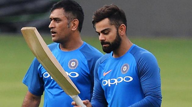 Virat Kohli (R) and MS Dhoni arrive for a practice session ahead of the fourth One Day International (ODI) between India and Australia at the M. Chinnaswamy Stadium in Bangalore. (AFP) Virat Kohli (R) and MS Dhoni arrive for a practice session ahead of the fourth One Day International (ODI) between India and Australia at the M. Chinnaswamy Stadium in Bangalore. (AFP)