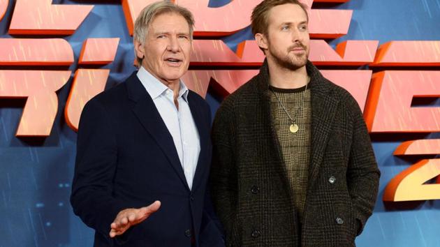 Harrison Ford poses with Ryan Gosling during a photocall to promote Blade Runner 2049 at a hotel in central London.(REUTERS)